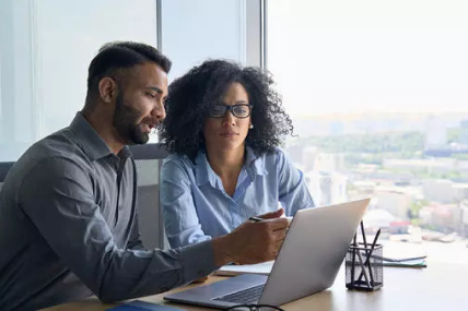 Dallas Business Owners On Laptop