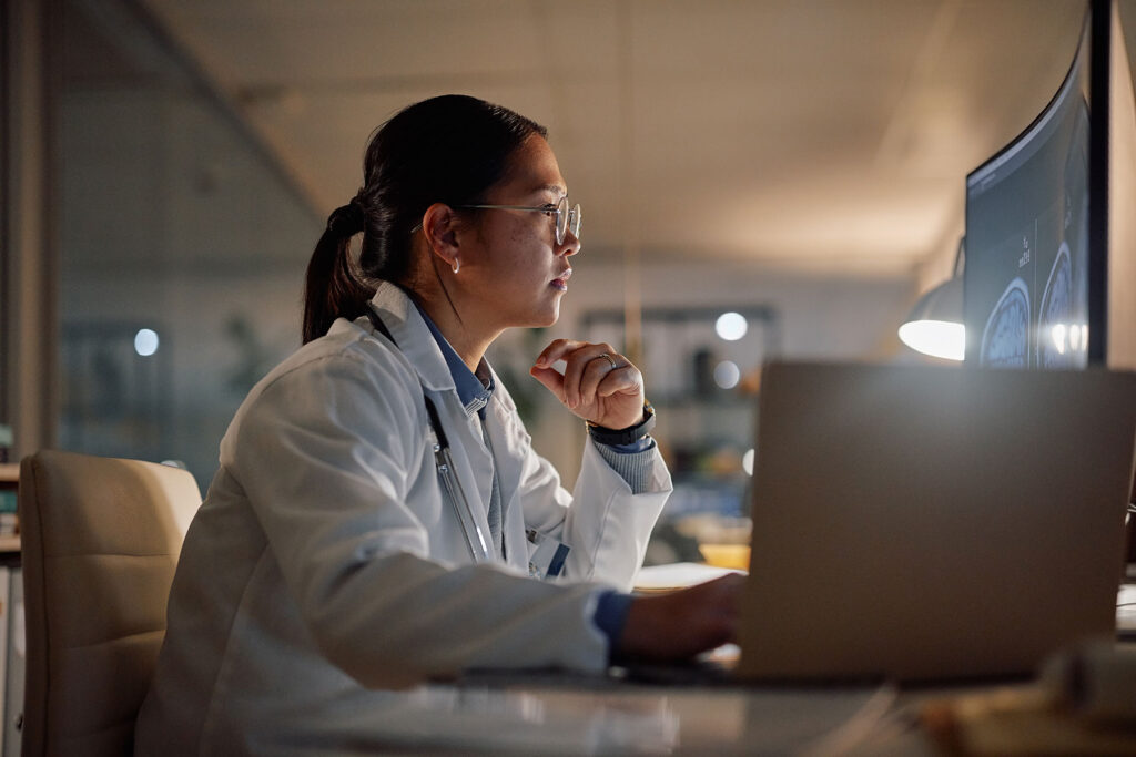 healthcare professional using business computer